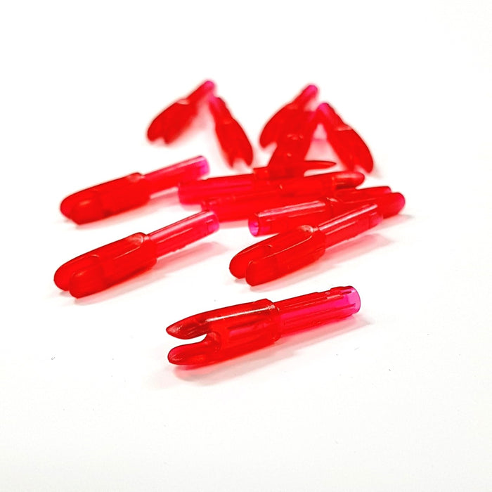 Several red EV-M micro diameter nocks of small throat size by Evolusion Arrows from Ten Zone Archery