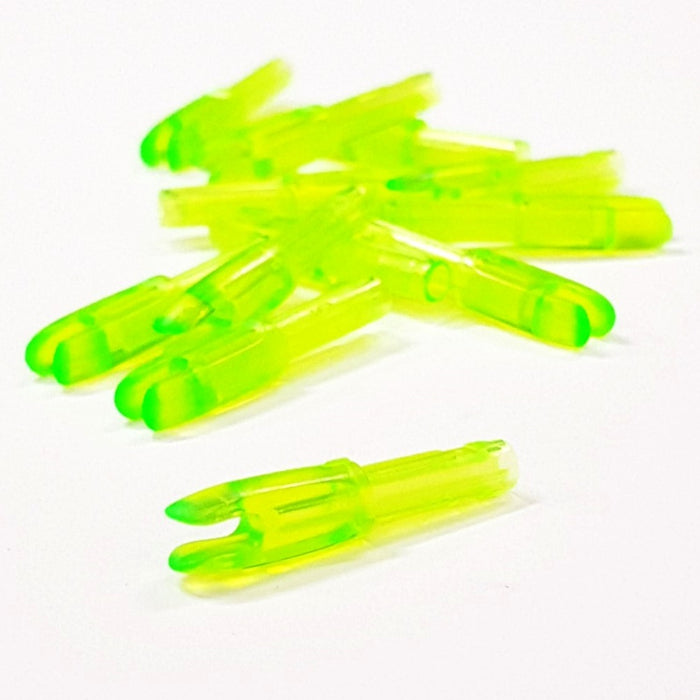Several green EV-M micro diameter nocks of small throat size by Evolusion Arrows from Ten Zone Archery